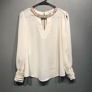 Cream blouse with jeweled collar